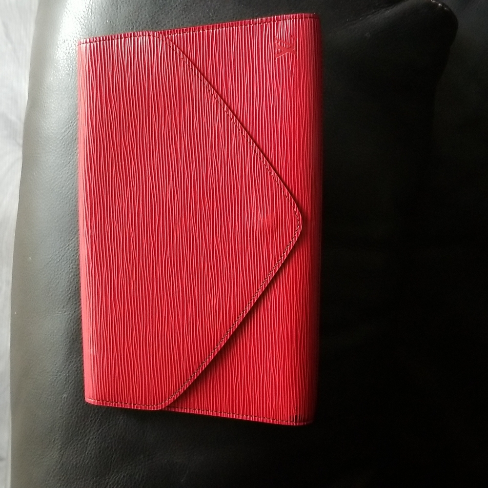 Authentic Luis Vuitton Pochette Arts-Deco Cluth.